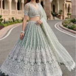 Alluring Green Sequins Net Engagement Wear Lehenga Choli With Dupatta